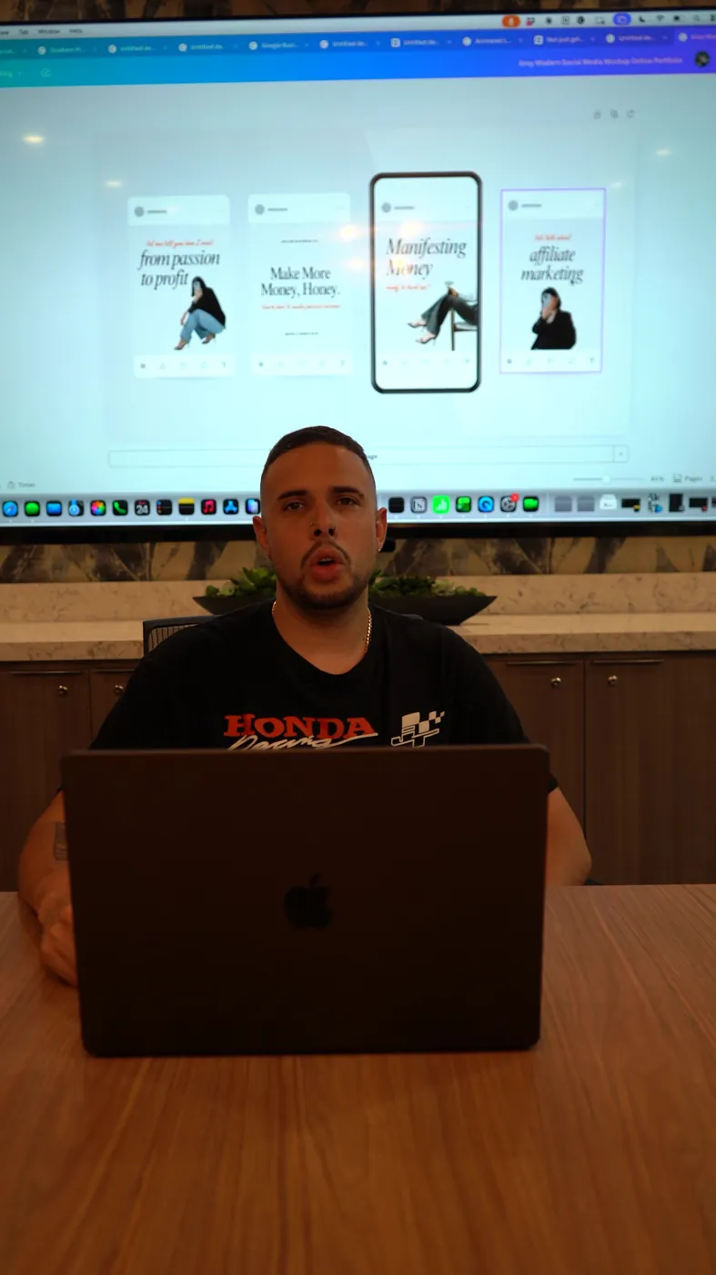 Optic Vault editor reviewing Instagram creative on a laptop