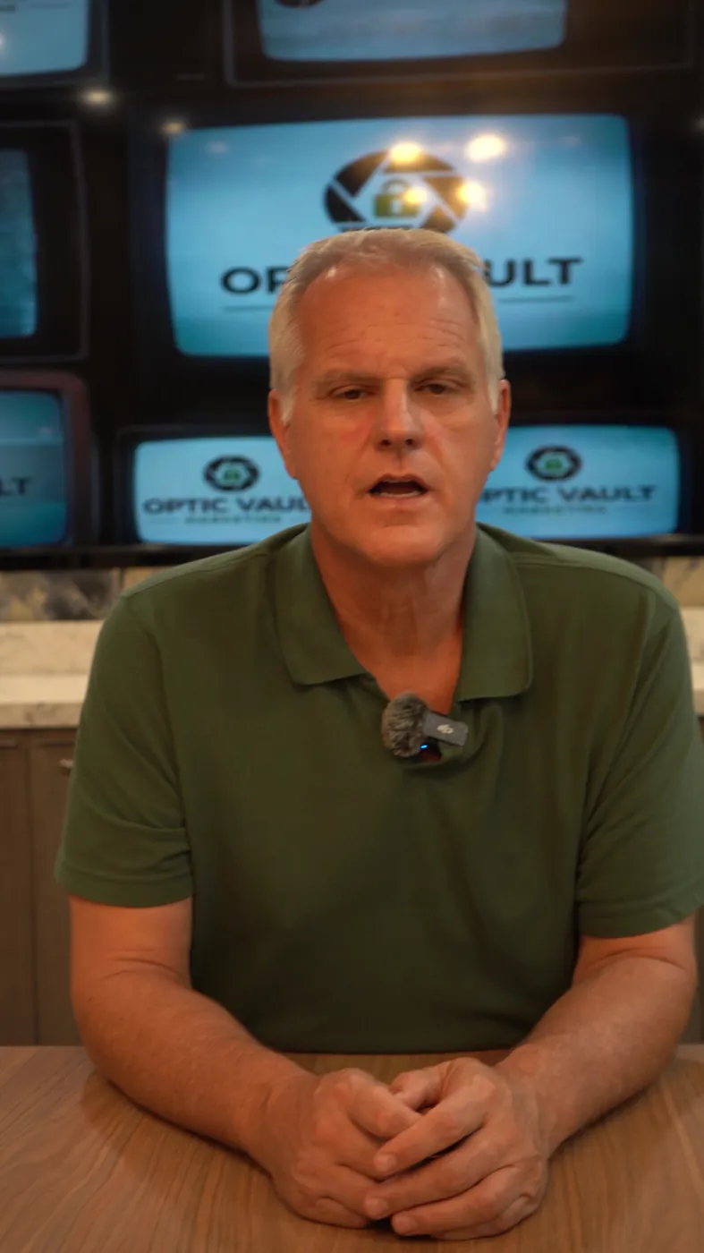 Stanley Sumner on camera with the Optic Vault Marketing logo on screen